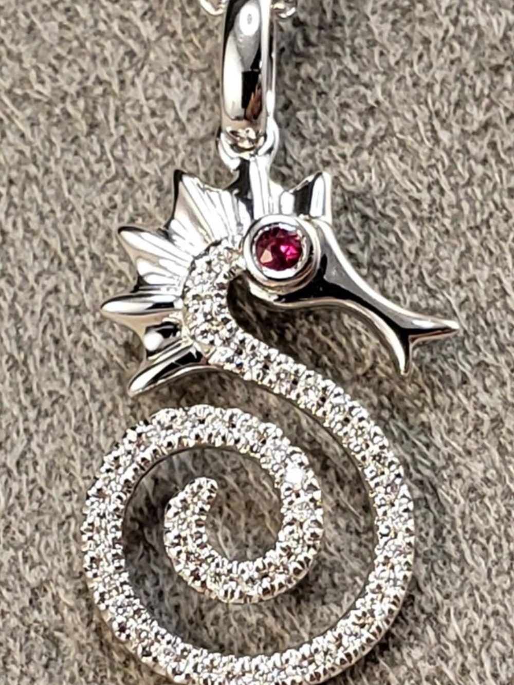 Ice Carat Seahorse Pendant with Ruby Accent Eye. Pendant only no chain.